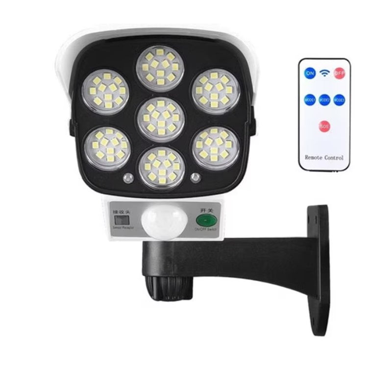 Lampă Solară Exterior cu Senzor de Mișcare, Telecomandă și 77 LED-uri – Model Cameră Supraveghere, IP65