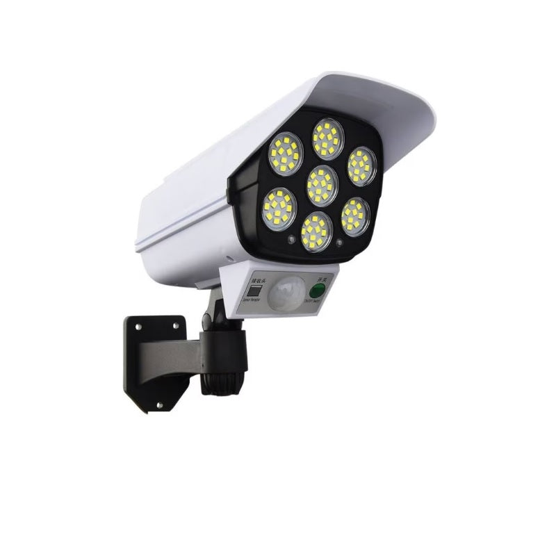 Lampă Solară Exterior cu Senzor de Mișcare, Telecomandă și 77 LED-uri – Model Cameră Supraveghere, IP65